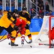 GANGNEUNG, SOUTH KOREA - FEBRUARY 25: Germany's Gerrit Fauser #43 stickhandles the puck with Olympic Athletes from Russia's Vyacheslav Voinov #26 chasing during gold medal round action at the PyeongChang 2018 Olympic Winter Games. (Photo by Andrea Cardin/HHOF-IIHF Images)

